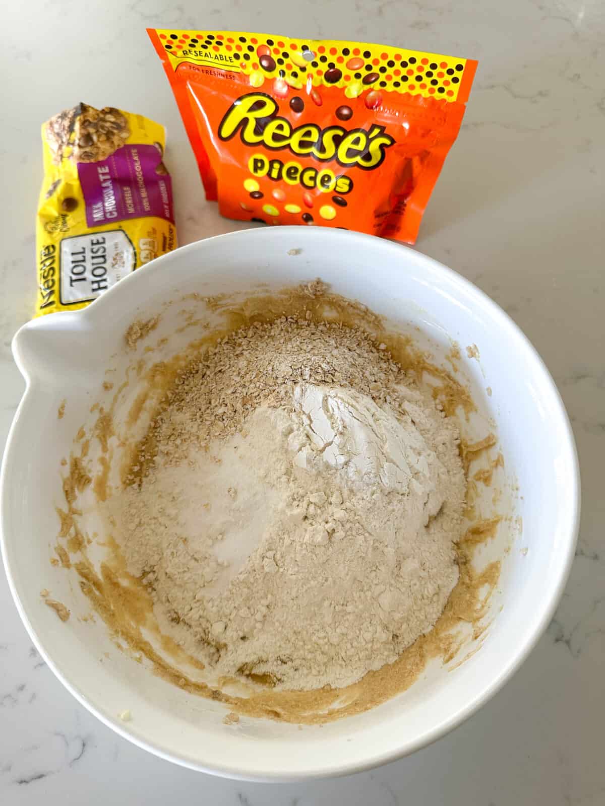 dry ingredients for reese's pieces cookies in bowl