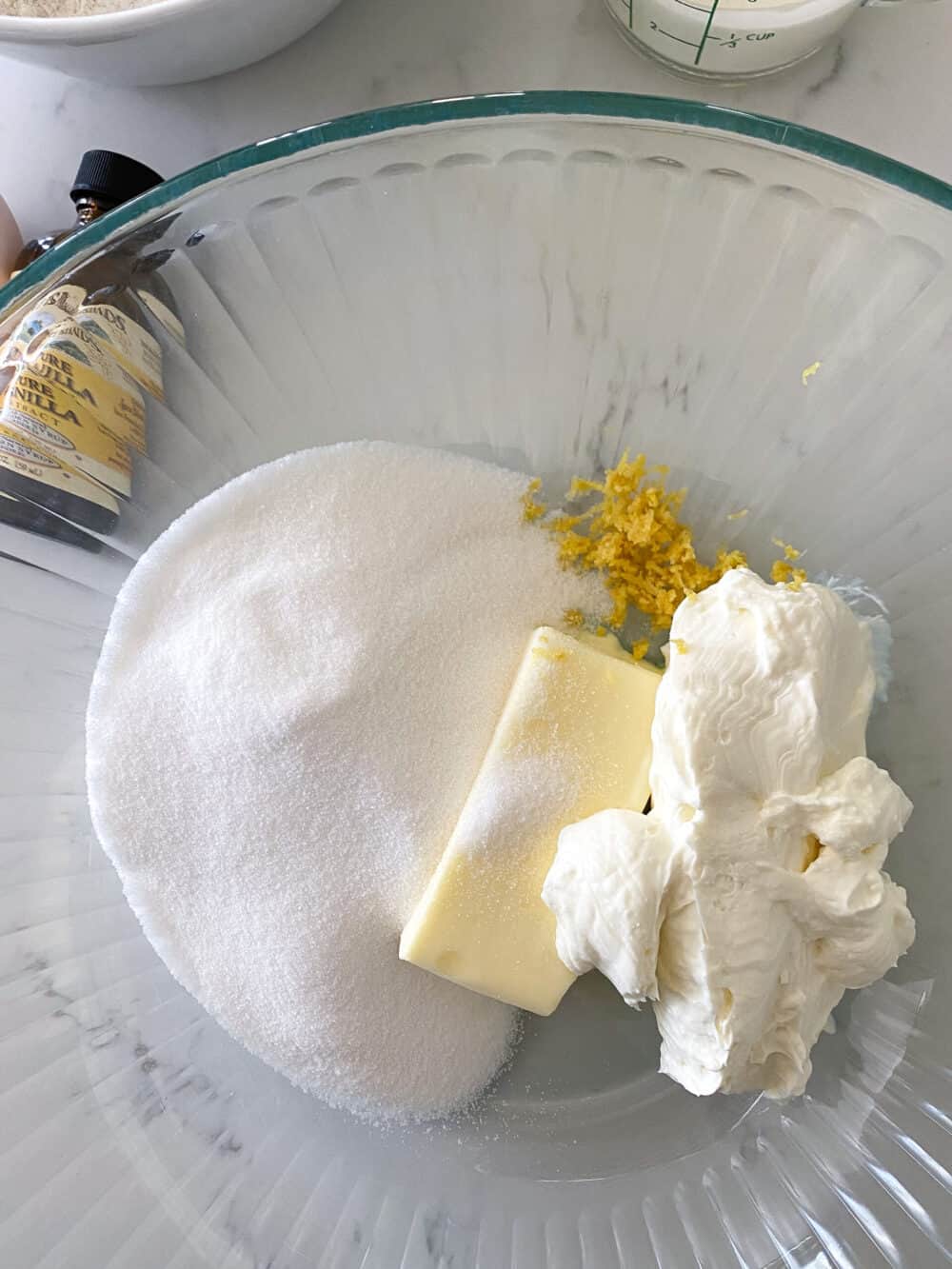 Butter, Sugar, Cream Cheese and Lemon Zest in a Large Glass Bowl