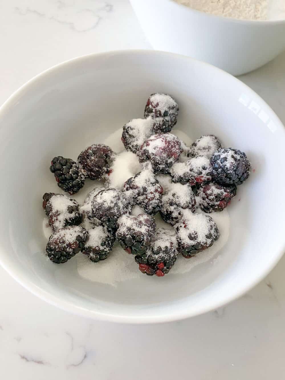 Sugar-Coated Blackberries in a Small White Bowl