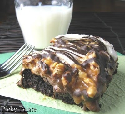 A Peanut Butter Caramel Popcorn Brownie with a Cold Glass of Milk