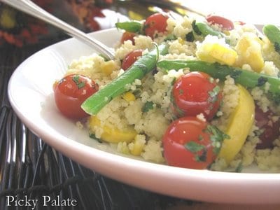 A dish full of garden vegetable couscous.