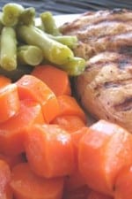 Italian grilled chicken with honey glazed carrots and garlic green beans.