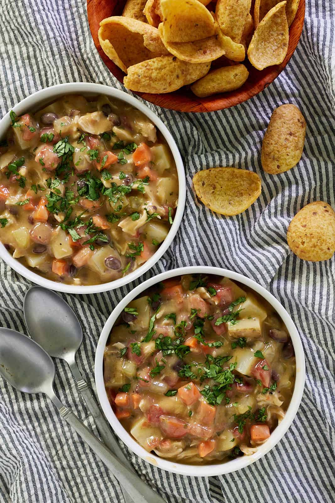 queso chicken soup in serving bowls