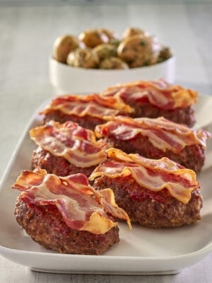cooked mini meatloaf on serving plate