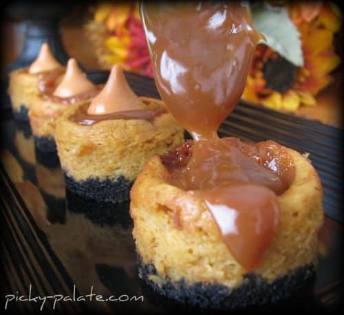 A Spoonful of Caramel Being Added to a Mini Cheesecake Bite