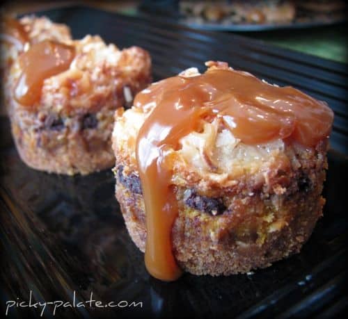 Pumpkin spice magic bar minis with caramel sauce on top.