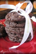 A stack of Chocolate Fudge Butterfinger Cookies wrapped in a ribbon.