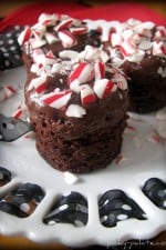 Three Candy Cane Kiss Centered Brownie Bites on a plate.