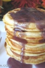 A stack of Silverdollar Waffle Pancakes with Blackberry Syrup