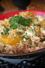 Bowl of mandarin quinoa salad with balsamic dressing.