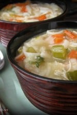 Two bowls full of Chunky Chicken Noodle and Vegetable Soup