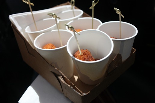 Six Paper Cups Filled with Fried Mac and Cheese Balls