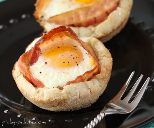 A Bacon Egg & Cheese McMuffin Cup on a Plate with a Fork