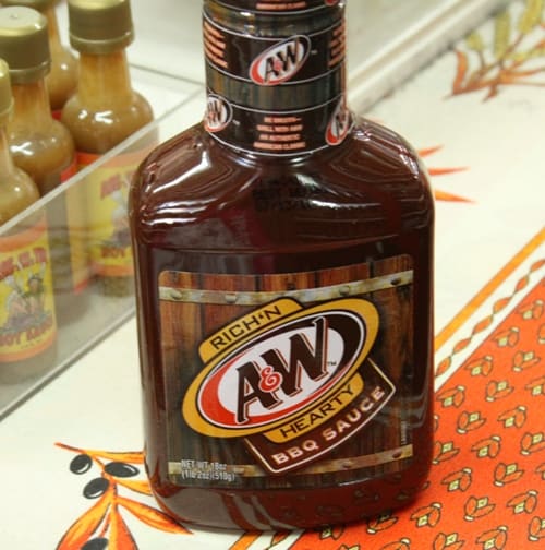 A Bottle of A&W Barbecue Sauce on an Orange and White Table