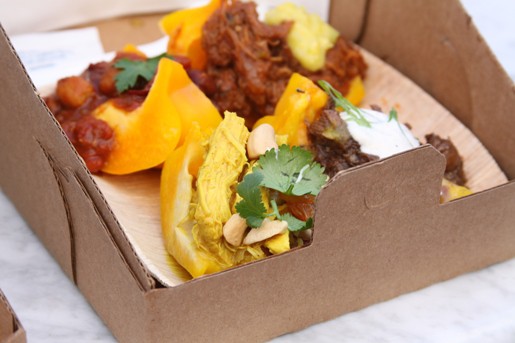 Assorted Peppers on a Paper Plate inside a Carboard Box