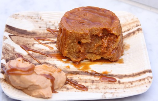 A Half-Devoured Helping of Butterscotch Bread Pudding on a Plate