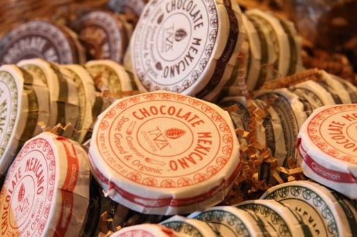 A Shelf Full of Large, Round Packaged Chocolates from Mexico
