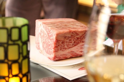 A Slab of Kobe Beef on a Plate at Our Table