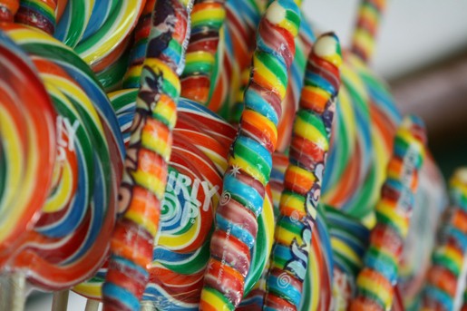 An Array of Rainbow Lollipops with Swirling Colors