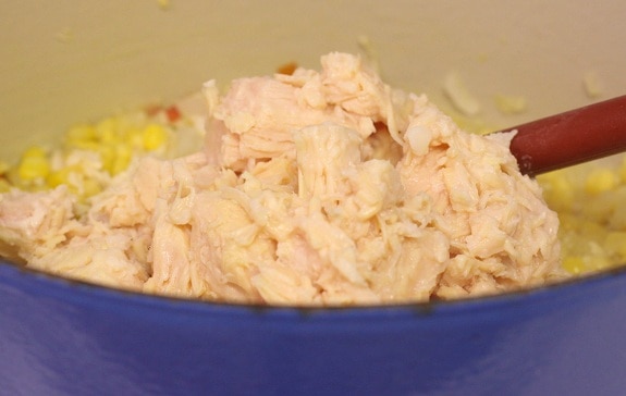 Stirring Canned Chicken Into the Canned Corn Mixture