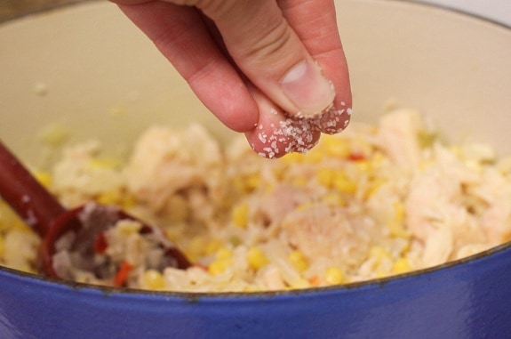 Sprinkling Salt into the Chicken Mixture