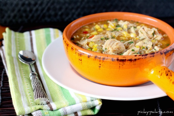 Pizza Soup in a Crock Beside a Dish Towel