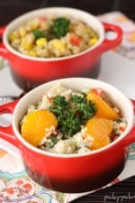 Two bowls of cold quinoa salads.