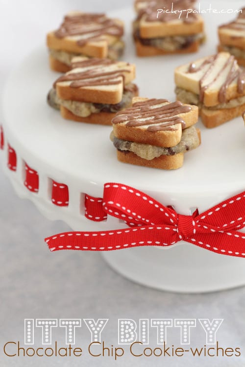 Mini chocolate chip sandwiches drizzled with chocolate on a cookie platter.