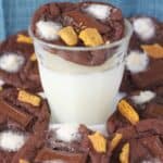 Chocolate Cake Smores Cookies surrounding a glass of milk