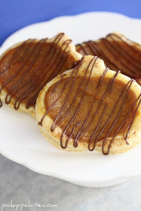 Image of Cinnamon Toasted Pumpkin Pie Tarts on a Plate