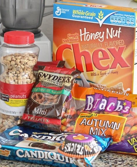 The ingredients for Mummy Munch Halloween Chex Mix.