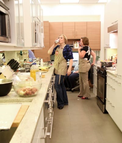 The Best Bite Girls Drinking Soda in their Kitchen Space