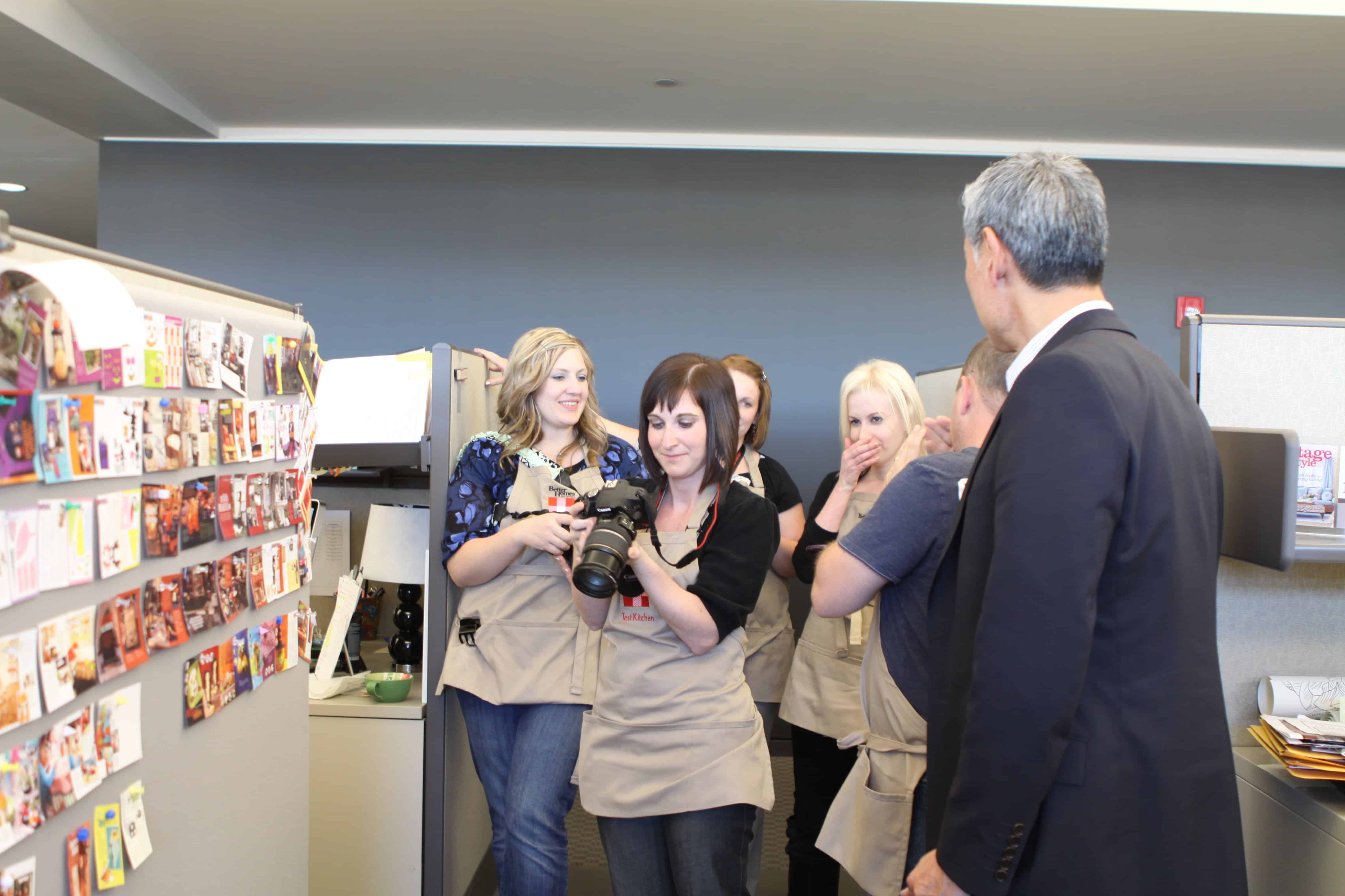 Food Bloggers in their BHG Aprons, Talking and Snapping Photos