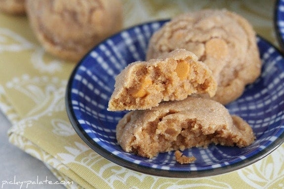Butterscotch peanut butter cookies stacked on a blue plate.