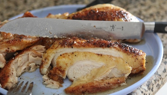 Cooked Mexi-Chicken Being Cut