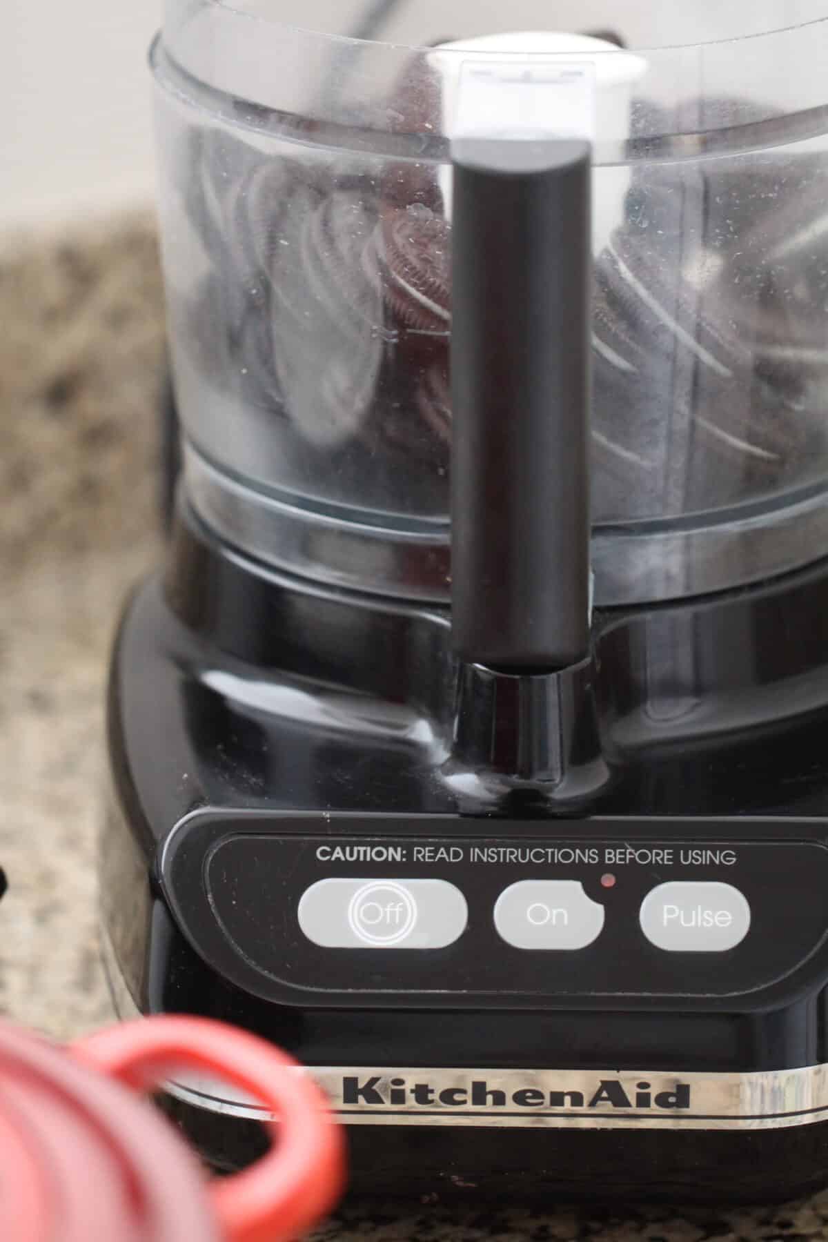 Oreos in food processor on counter