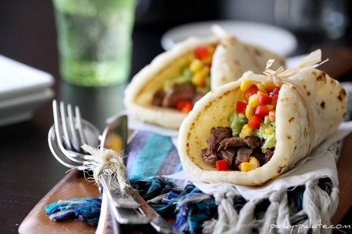 Two Carne Asada Tacos with Guacamole & Corn