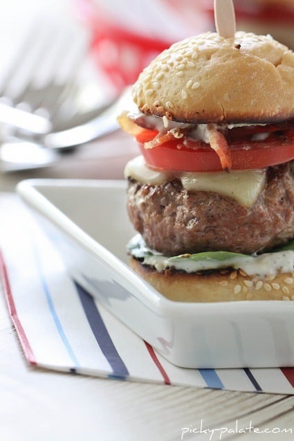 Off-Centered Image of a Juicy Bacon and Ranch Cajun Baby Cheeseburger