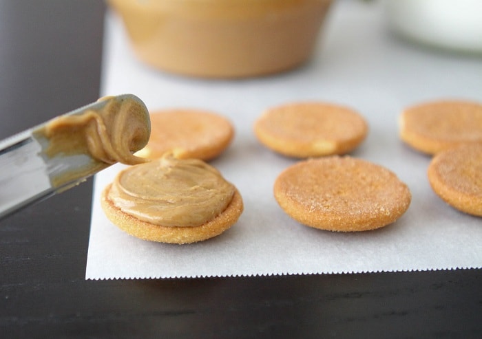 Spreading Peanut Butter onto Wafers