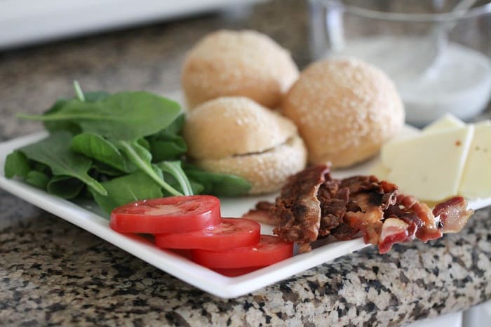 Image of Burger Buns and Toppings on a Plate