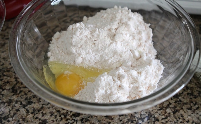 Image of Adding Egg to Cake Mix