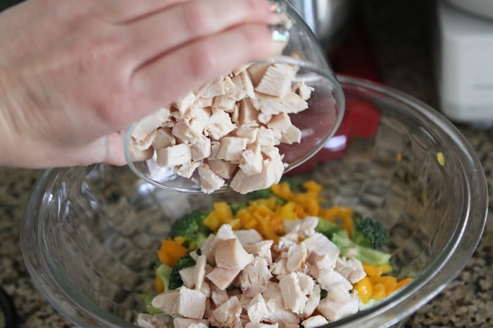 Image of Adding Cooked Chicken to the Salad
