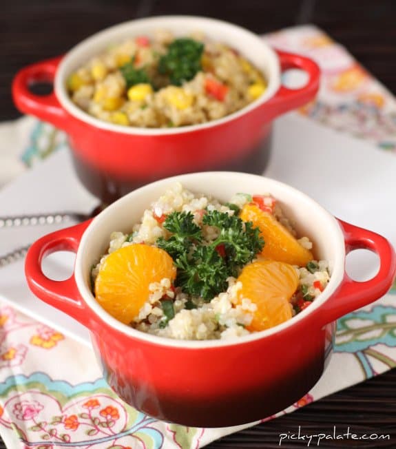 Two bowls of feta mandarin Asian quinoa salad.