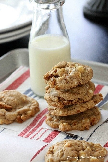 Image of Biscoff Crunch White Chocolate Chip Cookies with a Glass of Milk