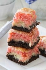 Image of a Stack of Neapolitan Gooey Cake Bars