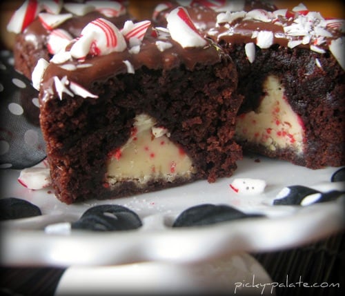 Candy cane brownie bites cut in half to reveal a Candy Cane Kiss on the inside.