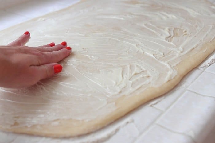 buttering dough