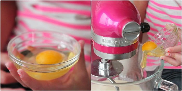 adding eggs to mixer 