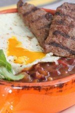 Image of Ancho Grilled Breakfast Steak Over Fried Egg and Beans
