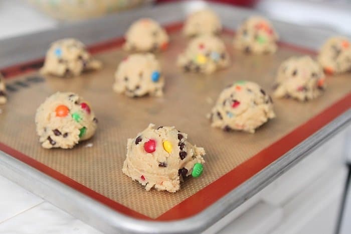 cookie dough scooped on baking sheet for The Best Chocolate Chip Cookies